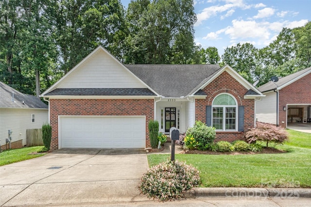 2333 Wednesbury Ct, Kannapolis, NC 28083 - view of front facade featuring brick siding, concrete driveway, an attached garage, a shingled roof, and a front yard