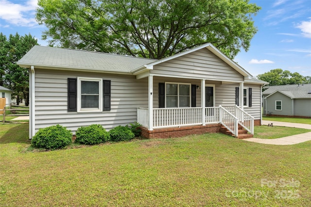 3103 Suggs St, Belmont, NC 28012 - ranch-style house featuring covered porch and a front lawn