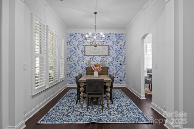 15913 Trenton Place Rd, Huntersville, NC 28078 - dining space featuring arched walkways, wood finished floors, a chandelier, ornamental molding, and baseboards
