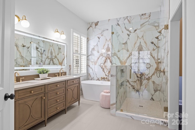 15913 Trenton Place Rd, Huntersville, NC 28078 - bathroom featuring a marble finish shower, a soaking tub, double vanity, and tile walls