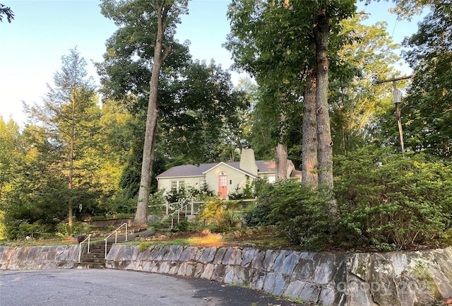 160 Hidden Hill Rd, Tryon, NC 28782 - view of side of home featuring a chimney