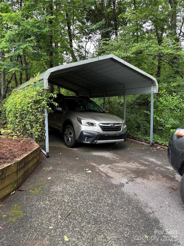 160 Hidden Hill Rd, Tryon, NC 28782 - view of parking / parking lot with driveway and a detached carport