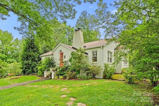 160 Hidden Hill Rd, Tryon, NC 28782 - view of front of home with a chimney and a front lawn