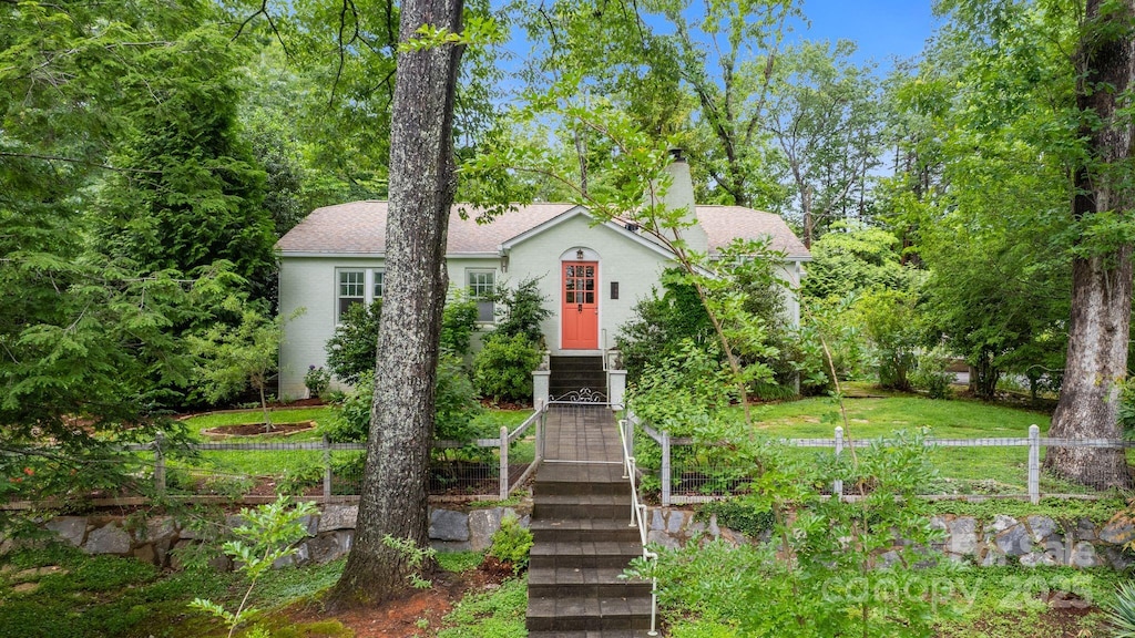 160 Hidden Hill Rd, Tryon, NC 28782 - view of front facade featuring a chimney and roof with shingles