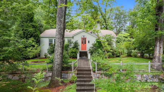 160 Hidden Hill Rd, Tryon, NC 28782 - view of front facade featuring a chimney and roof with shingles
