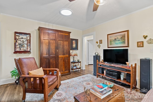 160 Hidden Hill Rd, Tryon, NC 28782 - living area featuring crown molding, wood finished floors, a ceiling fan, and baseboards
