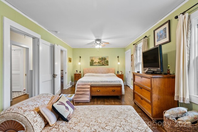 160 Hidden Hill Rd, Tryon, NC 28782 - bedroom featuring dark wood finished floors, ornamental molding, baseboards, and ceiling fan