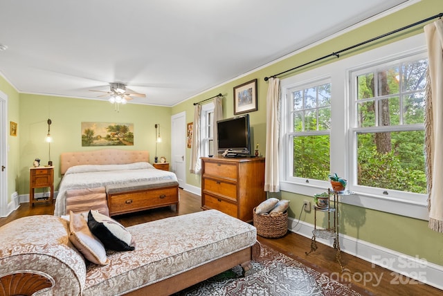 160 Hidden Hill Rd, Tryon, NC 28782 - bedroom featuring dark wood finished floors, crown molding, baseboards, and a ceiling fan
