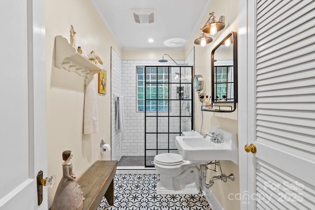 160 Hidden Hill Rd, Tryon, NC 28782 - bathroom featuring toilet, ornamental molding, tile patterned flooring, a tile shower, and a sink