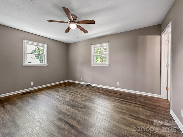 361 Settlemyer Rd, Morganton, NC 28655 - empty room with dark wood finished floors, baseboards, and a ceiling fan