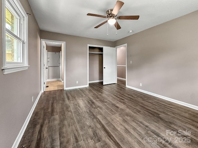 361 Settlemyer Rd, Morganton, NC 28655 - unfurnished bedroom with dark wood-style floors, baseboards, a closet, and ensuite bathroom