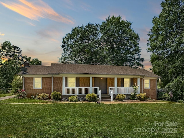 361 Settlemyer Rd, Morganton, NC 28655 - ranch-style home featuring covered porch, a front yard, brick siding, and a chimney