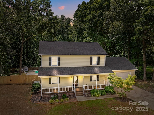 219 Proctor Dr, Salisbury, NC 28147 - view of front of property with covered porch, driveway, and an attached garage