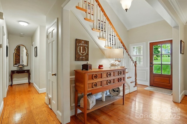 2025 Sagamore Rd, Charlotte, NC 28209 - foyer entrance featuring stairway, light wood finished floors, crown molding, and baseboards