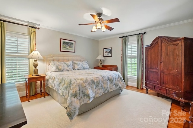 2025 Sagamore Rd, Charlotte, NC 28209 - bedroom featuring light wood finished floors, ornamental molding, and a ceiling fan