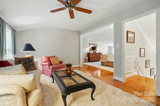 2025 Sagamore Rd, Charlotte, NC 28209 - living room with wood finished floors, a ceiling fan, and lofted ceiling