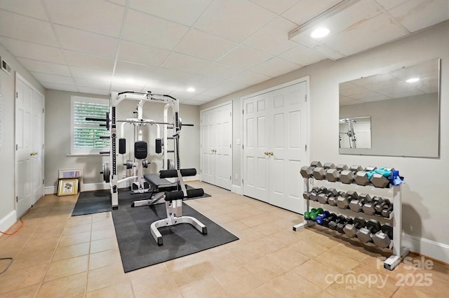 2025 Sagamore Rd, Charlotte, NC 28209 - exercise area featuring baseboards, tile patterned flooring, a paneled ceiling, and recessed lighting
