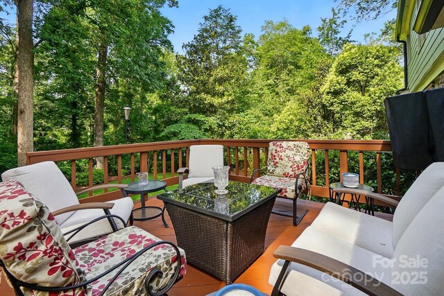 2025 Sagamore Rd, Charlotte, NC 28209 - wooden terrace featuring an outdoor hangout area