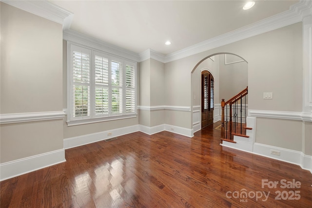 310 Ridge Reserve Dr, Clover, SC 29710 - unfurnished room with arched walkways, wood finished floors, crown molding, stairs, and recessed lighting