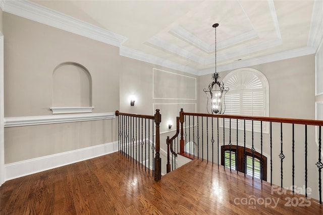 310 Ridge Reserve Dr, Clover, SC 29710 - hall featuring an upstairs landing, a chandelier, wood finished floors, crown molding, and baseboards