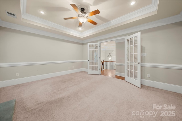 310 Ridge Reserve Dr, Clover, SC 29710 - unfurnished bedroom with french doors, ornamental molding, a tray ceiling, carpet, and recessed lighting