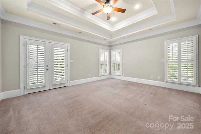 310 Ridge Reserve Dr, Clover, SC 29710 - empty room featuring ornamental molding, a raised ceiling, a ceiling fan, carpet, and baseboards
