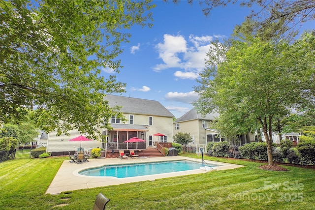8612 Tintinhull Ln, Waxhaw, NC 28173 - back of property with a sunroom, an outdoor pool, a patio, and a deck