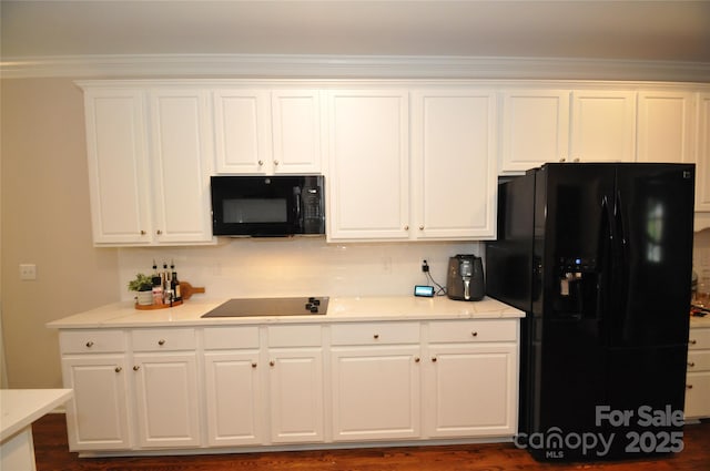 8612 Tintinhull Ln, Waxhaw, NC 28173 - kitchen with black appliances, white cabinetry, and crown molding