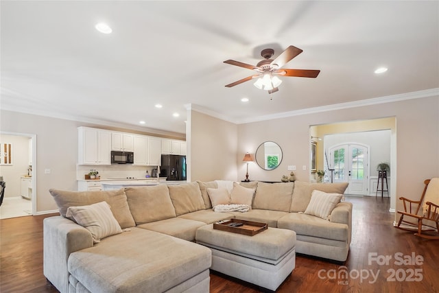 8612 Tintinhull Ln, Waxhaw, NC 28173 - living room featuring crown molding, ceiling fan, recessed lighting, dark wood finished floors, and baseboards