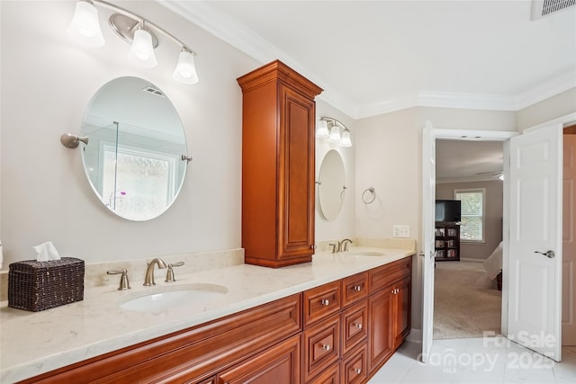 8612 Tintinhull Ln, Waxhaw, NC 28173 - bathroom with double vanity, crown molding, and tile patterned floors