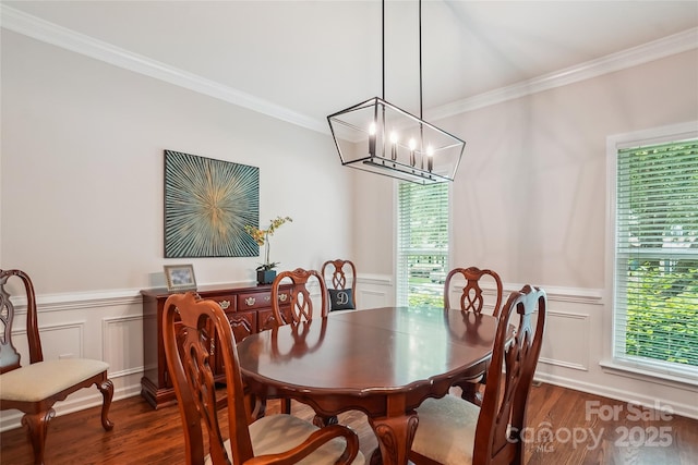 8612 Tintinhull Ln, Waxhaw, NC 28173 - dining space with wood finished floors, ornamental molding, a wainscoted wall, plenty of natural light, and a decorative wall
