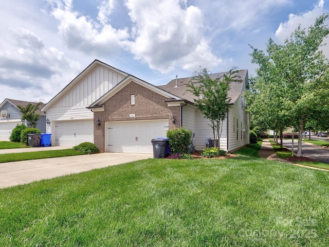 single story home featuring board and batten siding, brick siding, a front lawn, driveway, and a garage