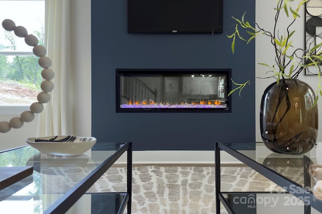 1025 Harrogate Dr, Bessemer City, NC 28016 - dining area view of a glass covered fireplace and baseboards