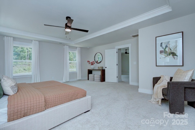 1025 Harrogate Dr, Bessemer City, NC 28016 - carpeted bedroom featuring a tray ceiling, crown molding, multiple windows, baseboards, and ceiling fan