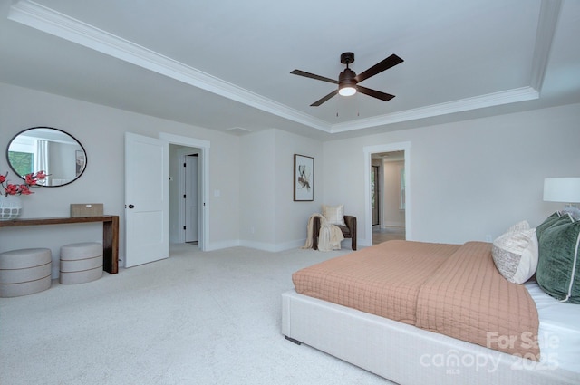 1025 Harrogate Dr, Bessemer City, NC 28016 - bedroom featuring carpet floors, ornamental molding, baseboards, ceiling fan, and a tray ceiling