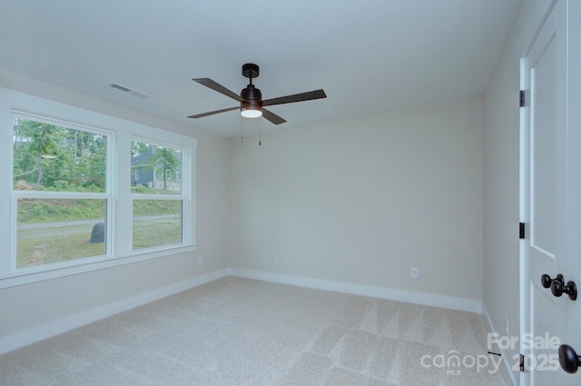 1025 Harrogate Dr, Bessemer City, NC 28016 - spare room with carpet flooring, a ceiling fan, and baseboards