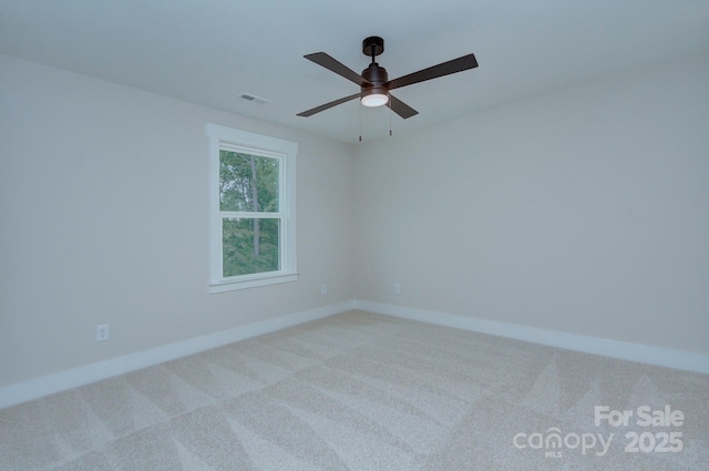 1025 Harrogate Dr, Bessemer City, NC 28016 - carpeted spare room with baseboards and ceiling fan