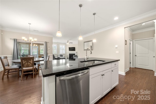 274 Robinwood Ln, Lake Wylie, SC 29710 - kitchen with stainless steel dishwasher, a sink, dark wood-type flooring, dark stone counters, and a fireplace