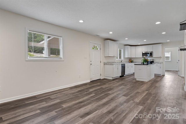 25 Southern Way, Nebo, NC 28761 - kitchen with stainless steel appliances, recessed lighting, white cabinetry, dark wood-style floors, and baseboards