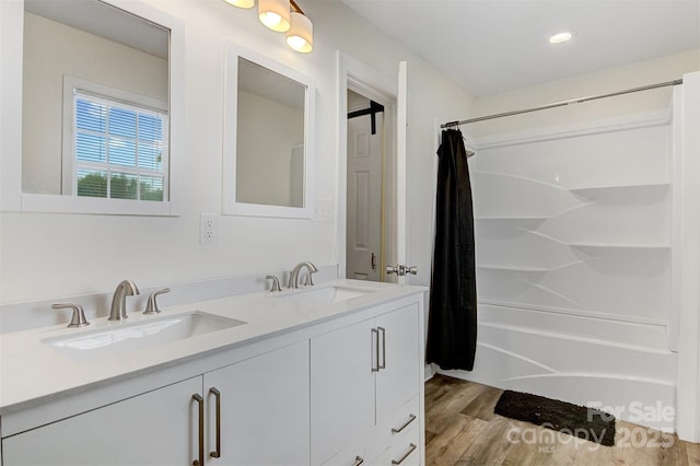 25 Southern Way, Nebo, NC 28761 - full bathroom featuring wood finished floors, shower / bath combination with curtain, double vanity, and recessed lighting