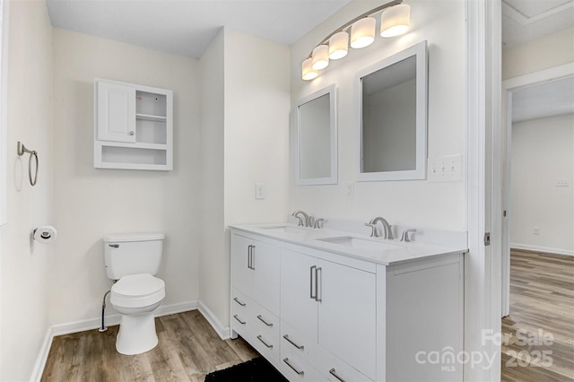 25 Southern Way, Nebo, NC 28761 - full bath featuring wood finished floors, baseboards, toilet, and double vanity