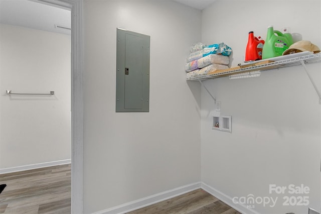 25 Southern Way, Nebo, NC 28761 - laundry area featuring electric panel, washer hookup, wood finished floors, and baseboards