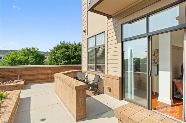 810 W 4th St Unit 201, Winston Salem, NC 27101 - view of patio with an outdoor hangout area