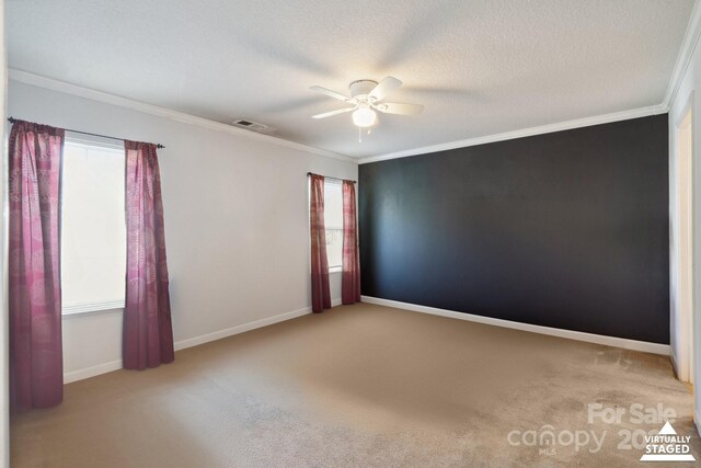 1457 Matthew Allen Cir, Kannapolis, NC 28081 - unfurnished room with a ceiling fan, crown molding, carpet flooring, baseboards, and a textured ceiling