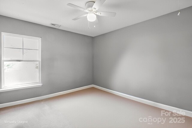 1457 Matthew Allen Cir, Kannapolis, NC 28081 - carpeted empty room with a ceiling fan and baseboards