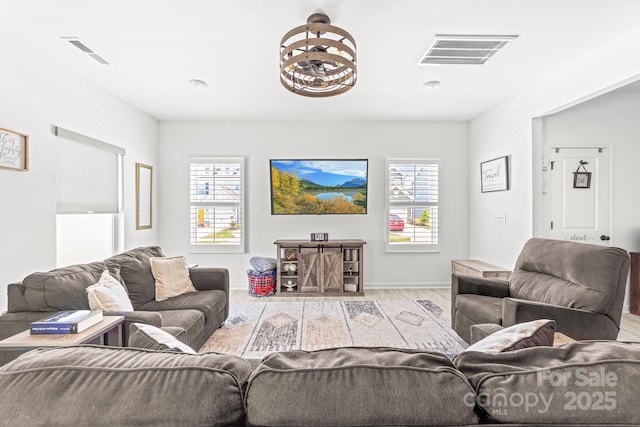 711 Bellmouth Rd, Clover, SC 29710 - living area featuring plenty of natural light, light wood-style floors, and baseboards