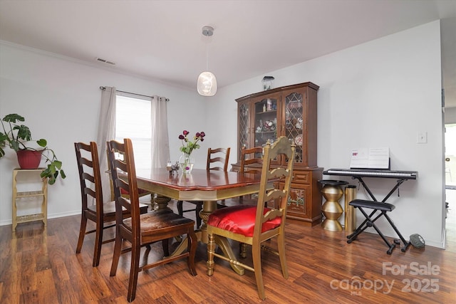 8511 Redding Glen Ave, Charlotte, NC 28216 - dining area featuring wood finished floors and baseboards
