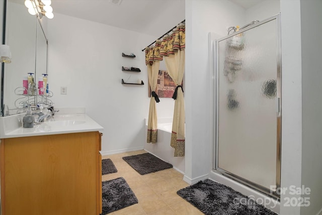 8511 Redding Glen Ave, Charlotte, NC 28216 - full bathroom featuring a shower stall, double vanity, a bath, and baseboards
