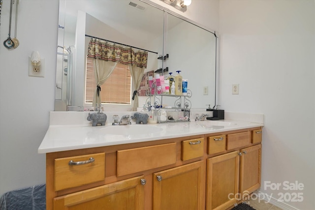 8511 Redding Glen Ave, Charlotte, NC 28216 - bathroom featuring double vanity and curtained shower
