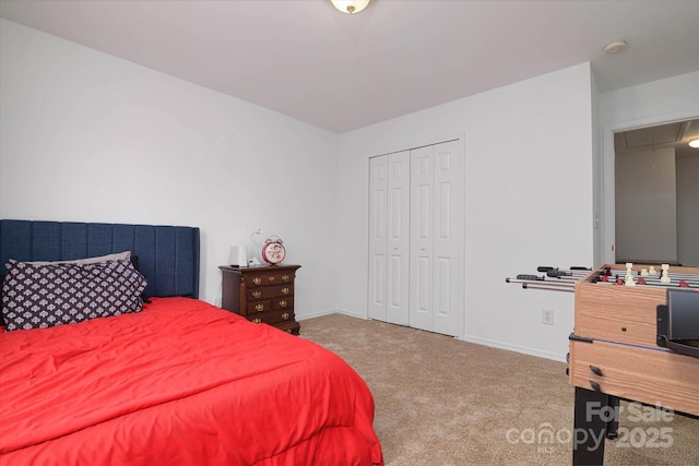 8511 Redding Glen Ave, Charlotte, NC 28216 - carpeted bedroom featuring attic access, a closet, and baseboards